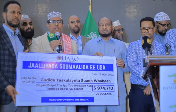 HARO presents $974,710 in relief raised by the Somali diaspora in the USA to traders affected by the Waaheen market fire, Hargeisa, 2022