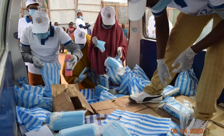 HARO volunteers pack face masks for community distribution during the COVID-19 response, April 2020
